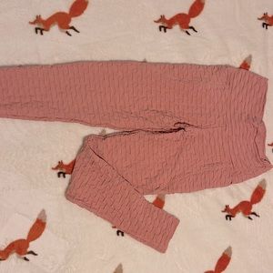 I am selling a pink leggings that have a scratch butt brand new size large.